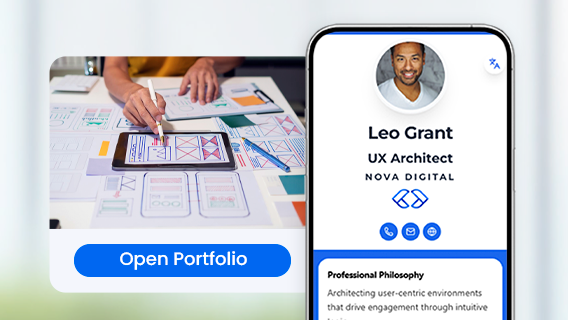 Designer reviewing wireframes on tablet next to digital business card with Open Portfolio button